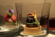 Left, Sesame and Green Tea Tofu with Lobster, Sea Urchin, Asparagus knot and a purple pansy petal. - Source: Getty