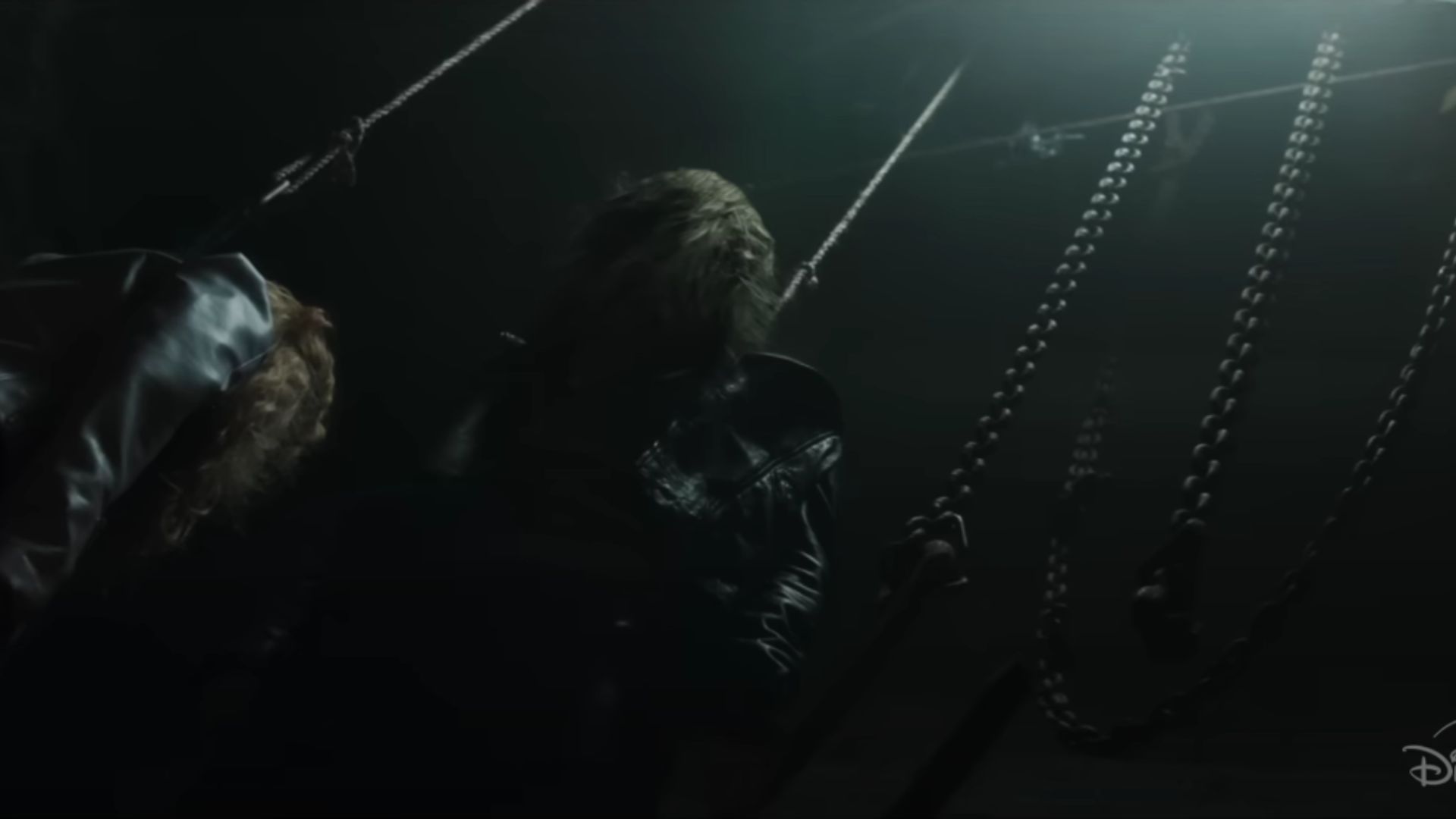 A still of some hostages in the trailer | Image via Marvel Entertainment