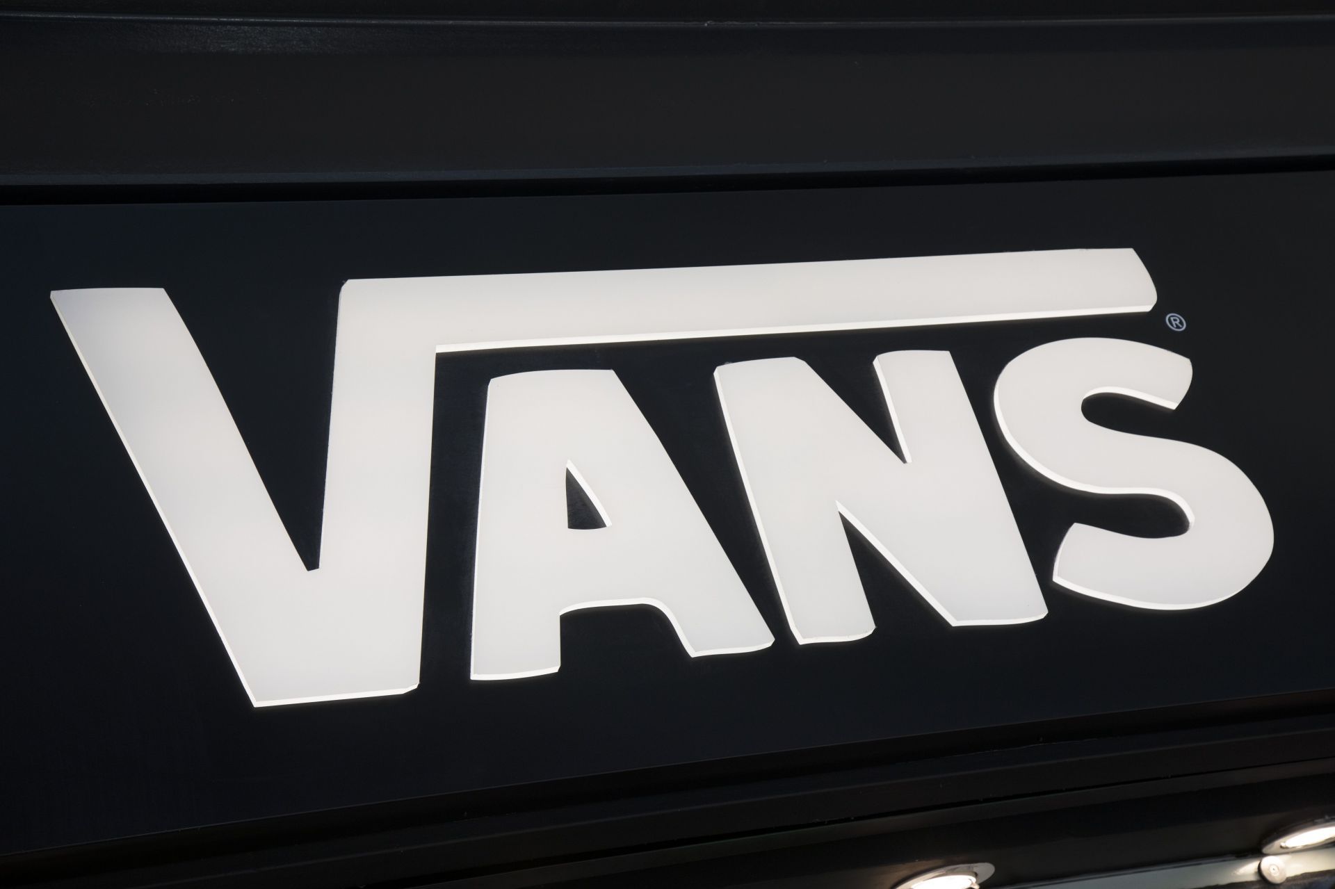 Sign For Shoe Shop Brand And Skatewear Shop Vans (Image via Getty)