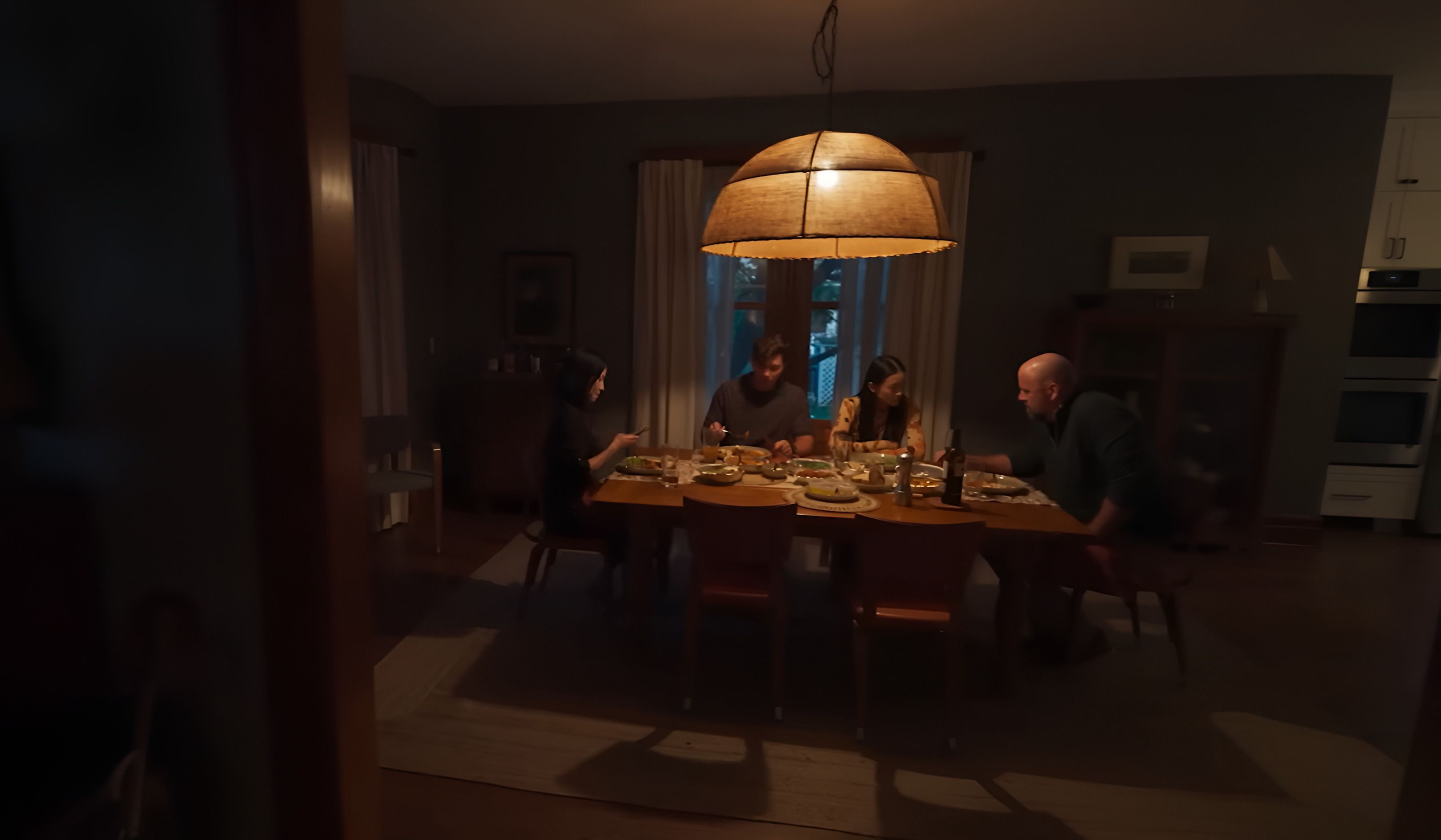 A family sitting together around a dining table