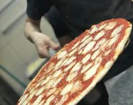 Thin Crust Pizza (Image via Instagram/@joeandpats)