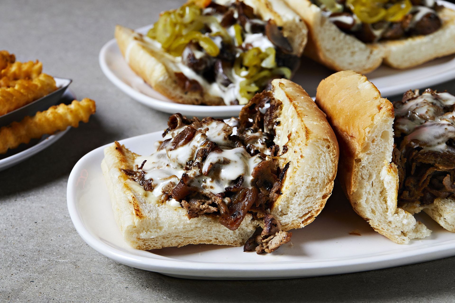 Cheesesteaks (Image via Getty)