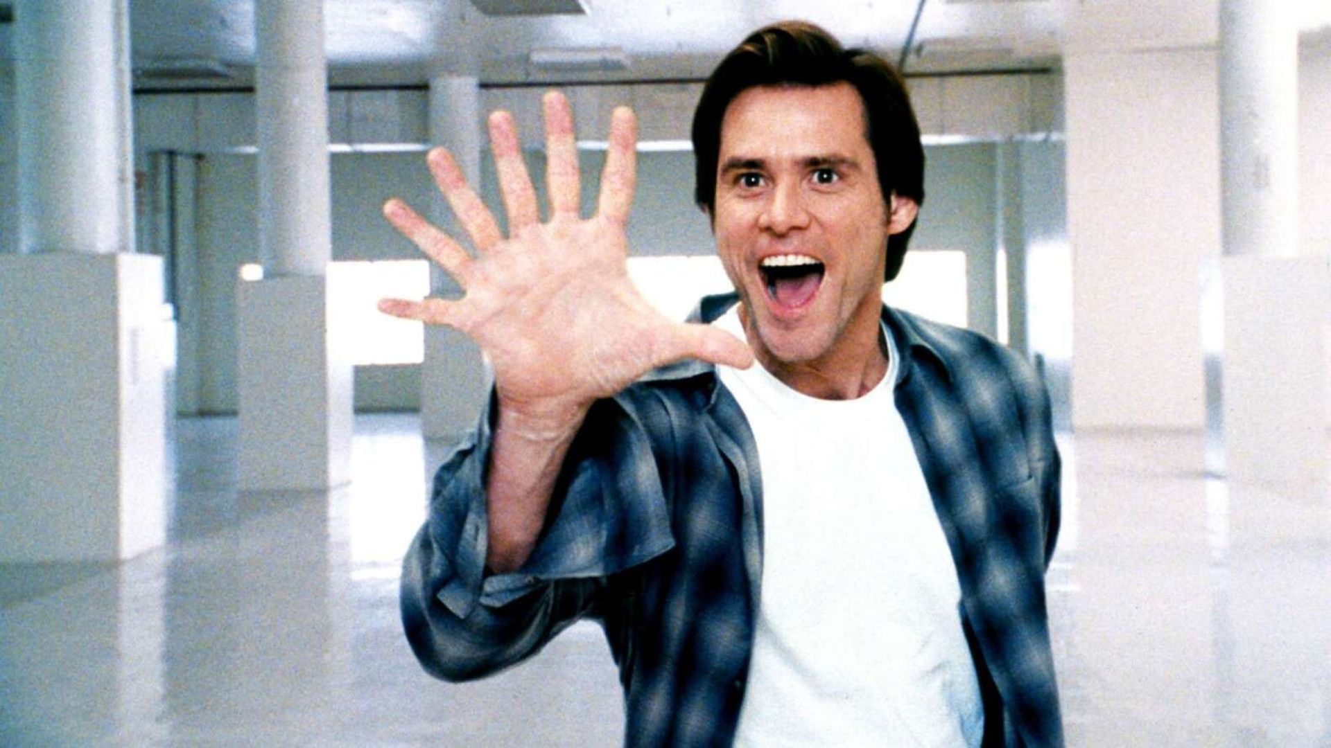 Jim Carrey dropped out of high school when he was 16. Image via Universal Pictures