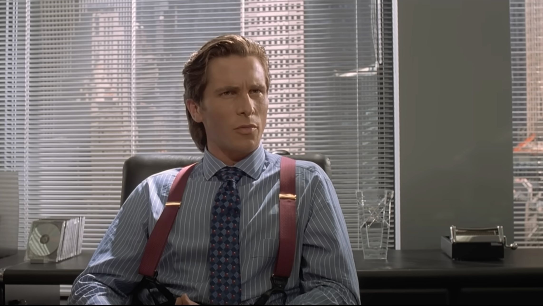 Christian Bale in American Psycho (Image via YouTube/@LionsgateMovies)