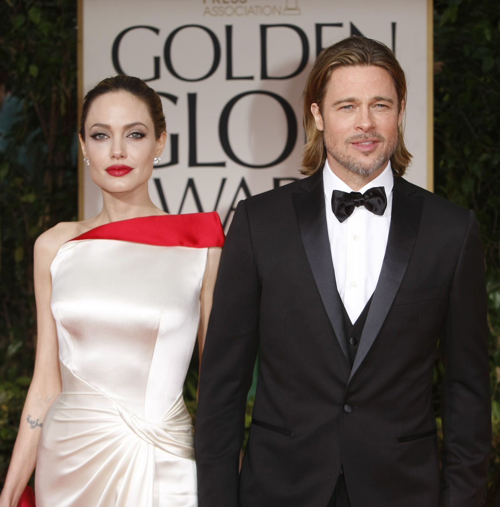 Angelina Jolie and Brad Pitt during coverage of the 69th Annual Golden Globe Awards show at The Bev - Source: Getty