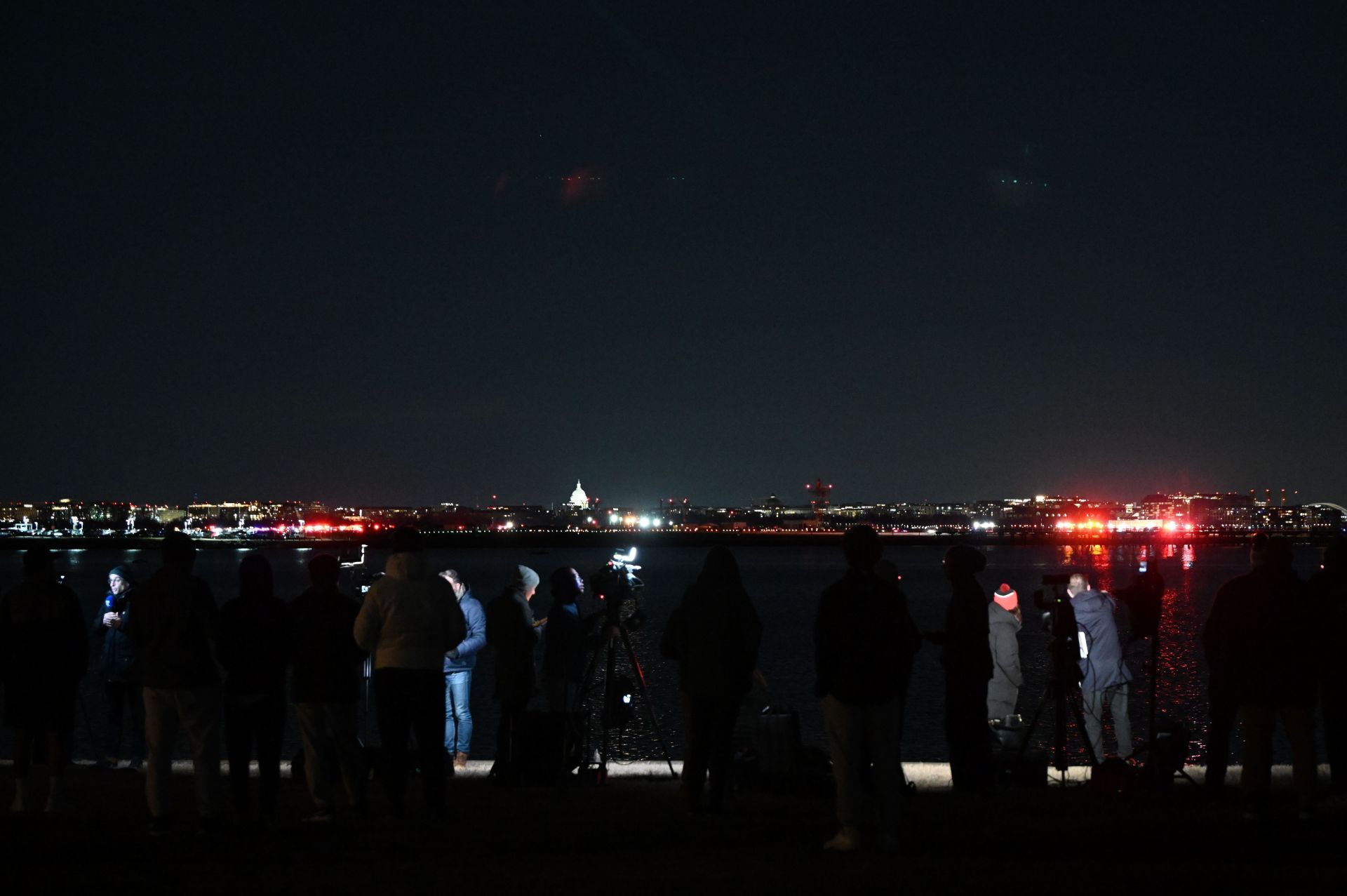 Plane collides with military helicopter in mid-air near US capital - Source: Getty