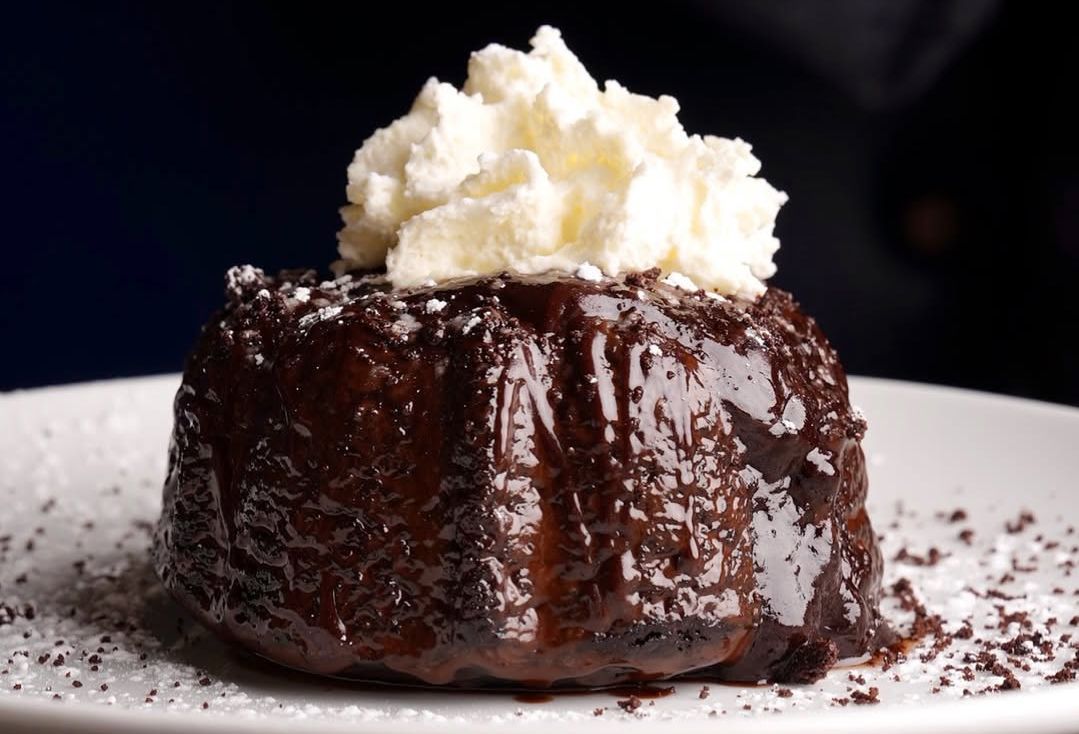 Chocolate cake from Rochambeau Boston. (Image via Instagram/@rochambeaubos)