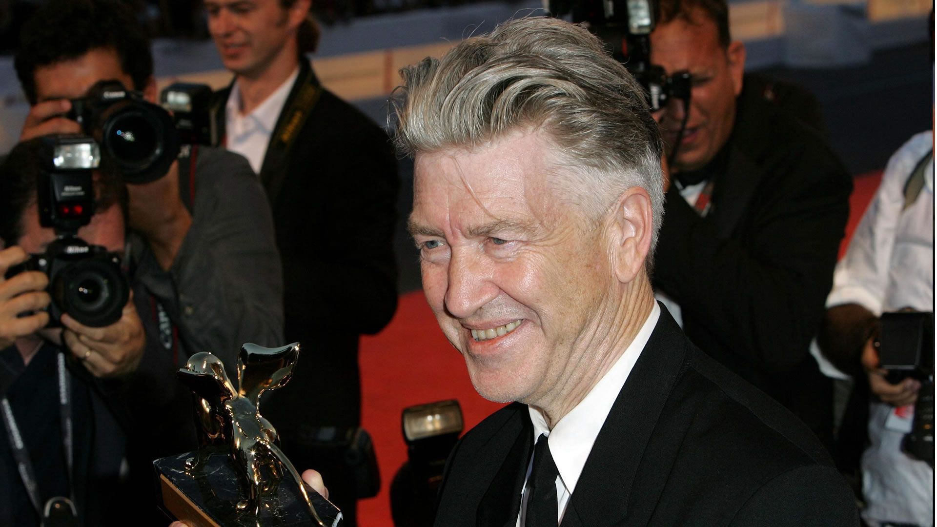 Filmmaker David Lynch smiling. | Image Source: JPI