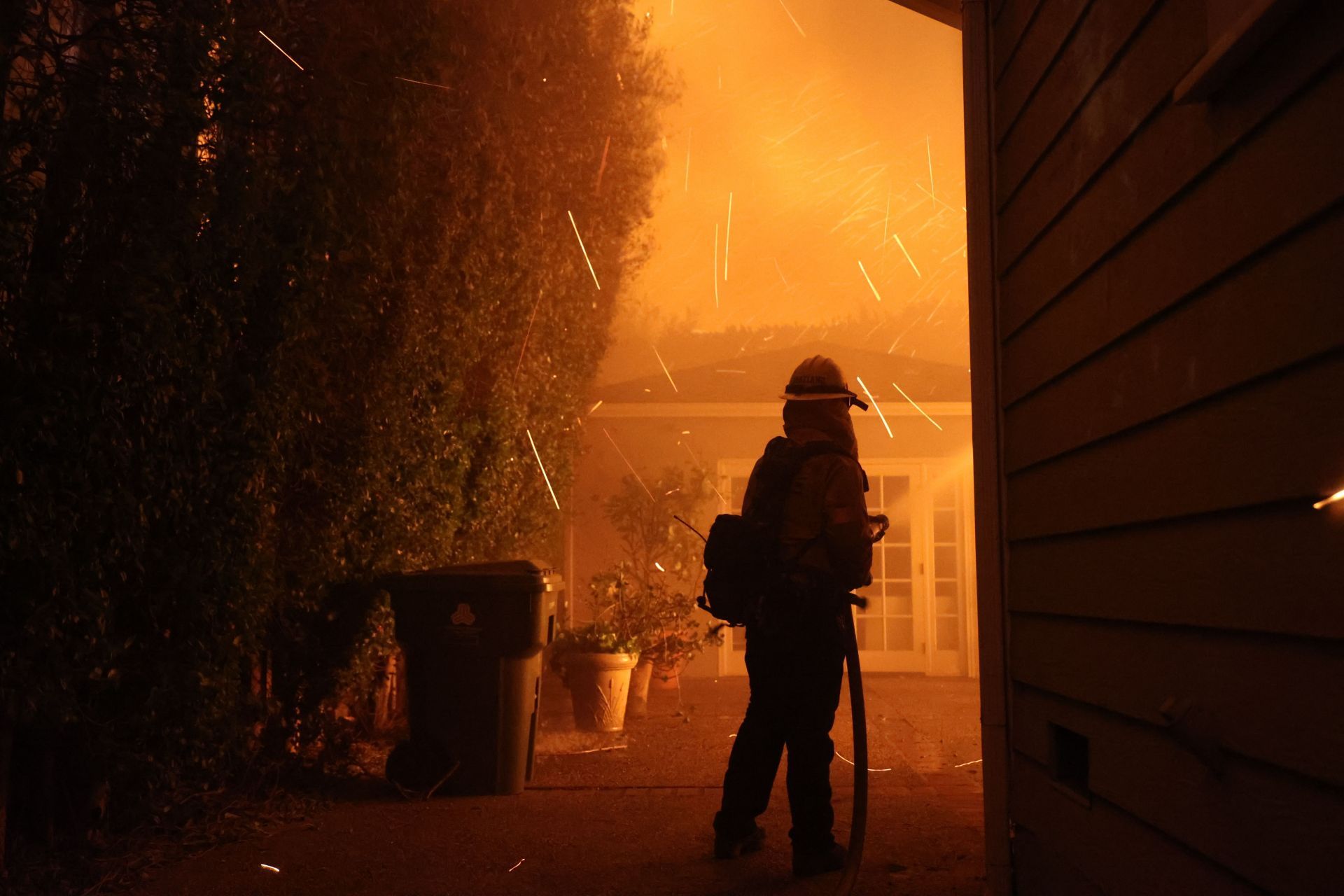 Firefighters continue battling Palisades fire in Los Angeles as flames rage out of control - Source: Getty