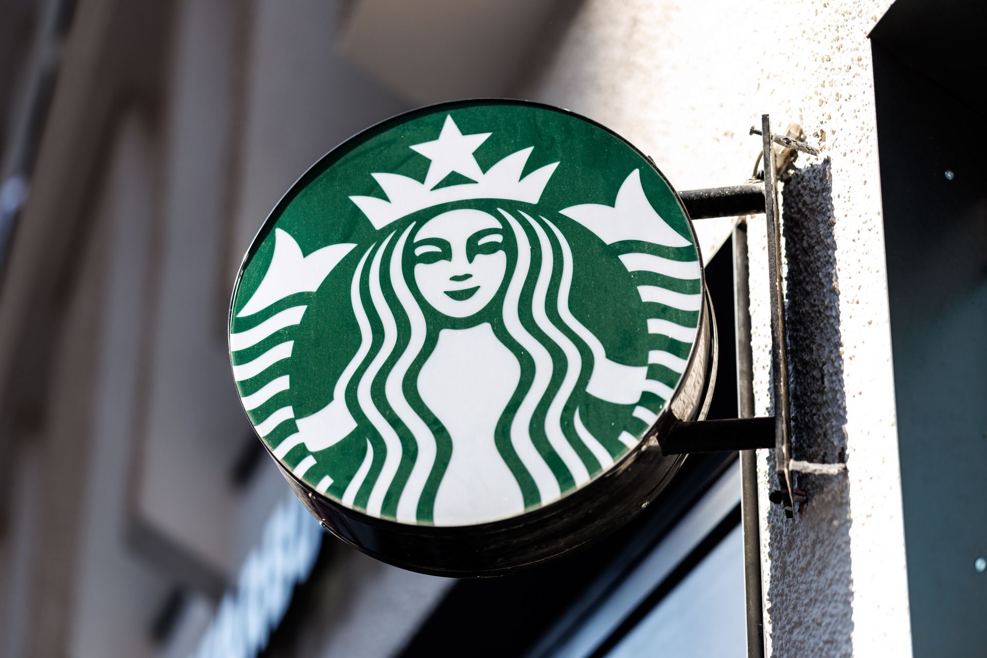 Starbucks corporate logo on a branch in the Ulm Inne - Source: Getty