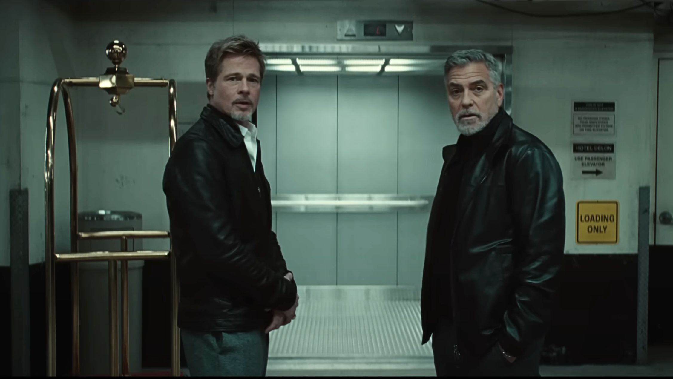 A still from the Wolfs trailer (Image via YouTube/@AppleTV) 