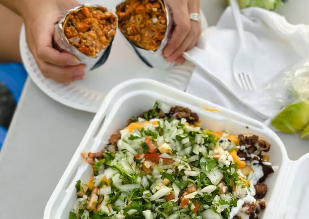 Carne Asada fries and Al Pastor burrito from Leo&rsquo;s Tacos Truck. (Image via Instagram/@leostacostruck)