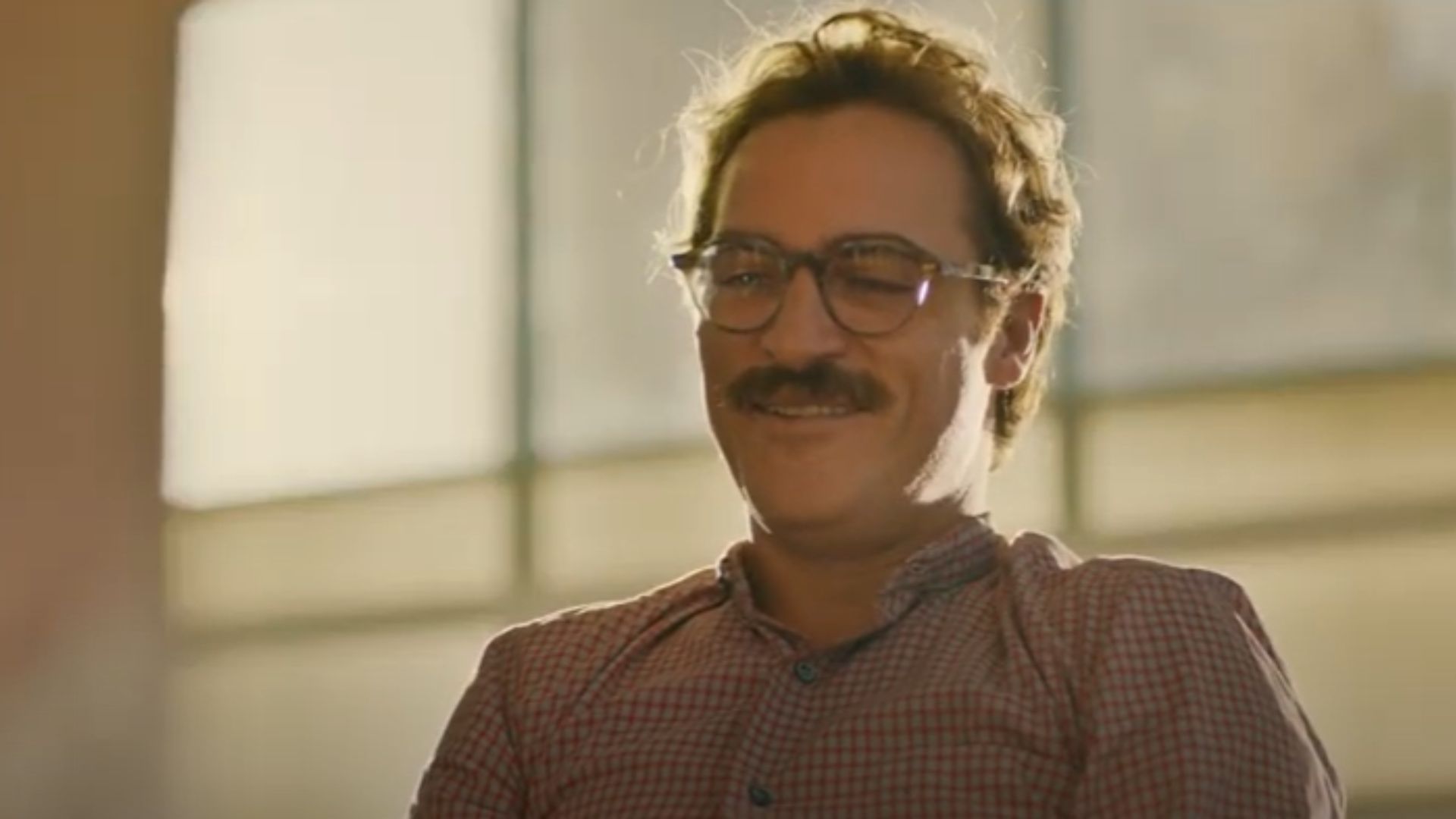 Joaquin Phoenix in Her| Image via Warner Bros. Picture