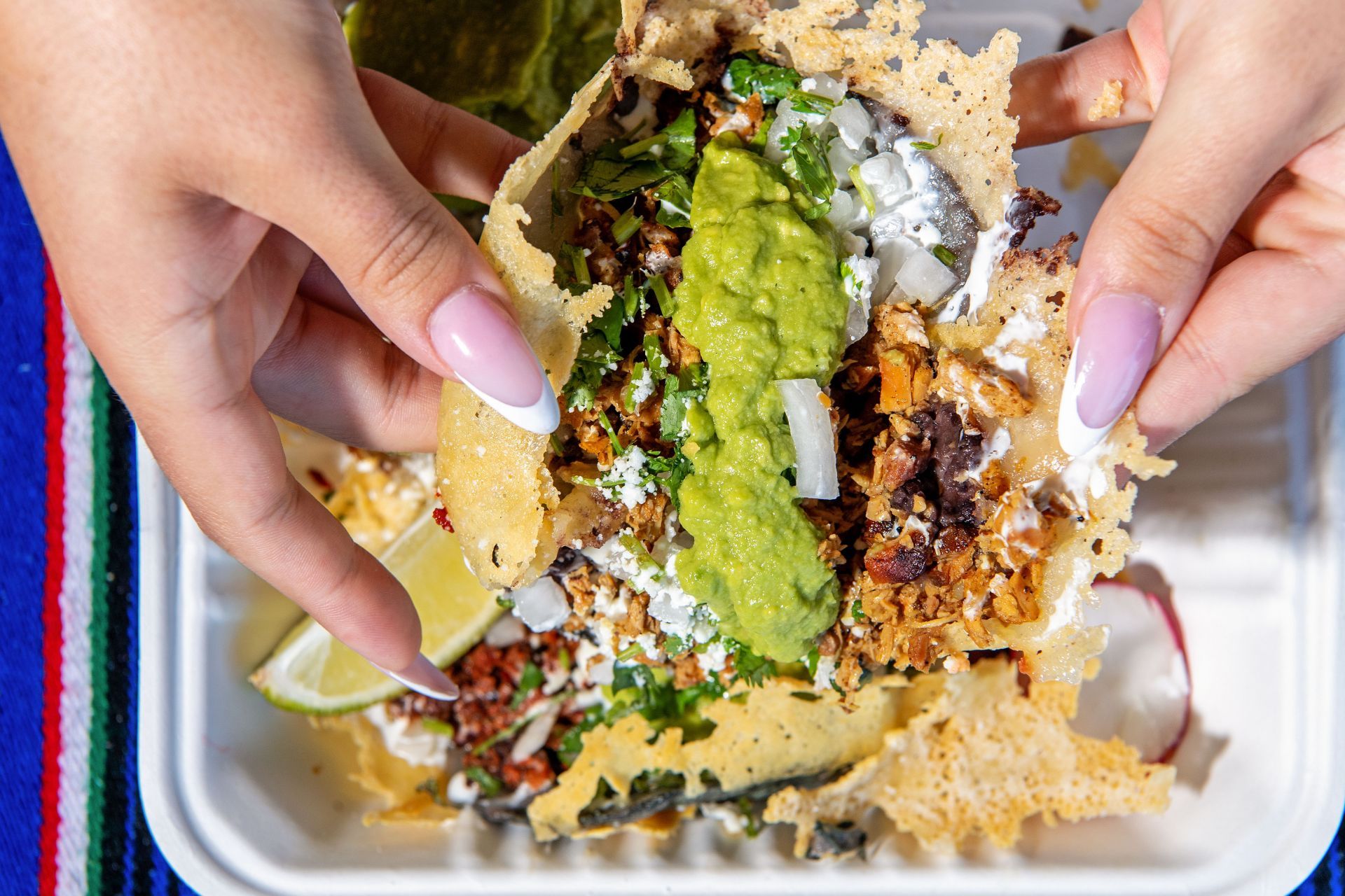 food and portraits at Villa&#039;s tacos for a restaurant review - Source: Getty