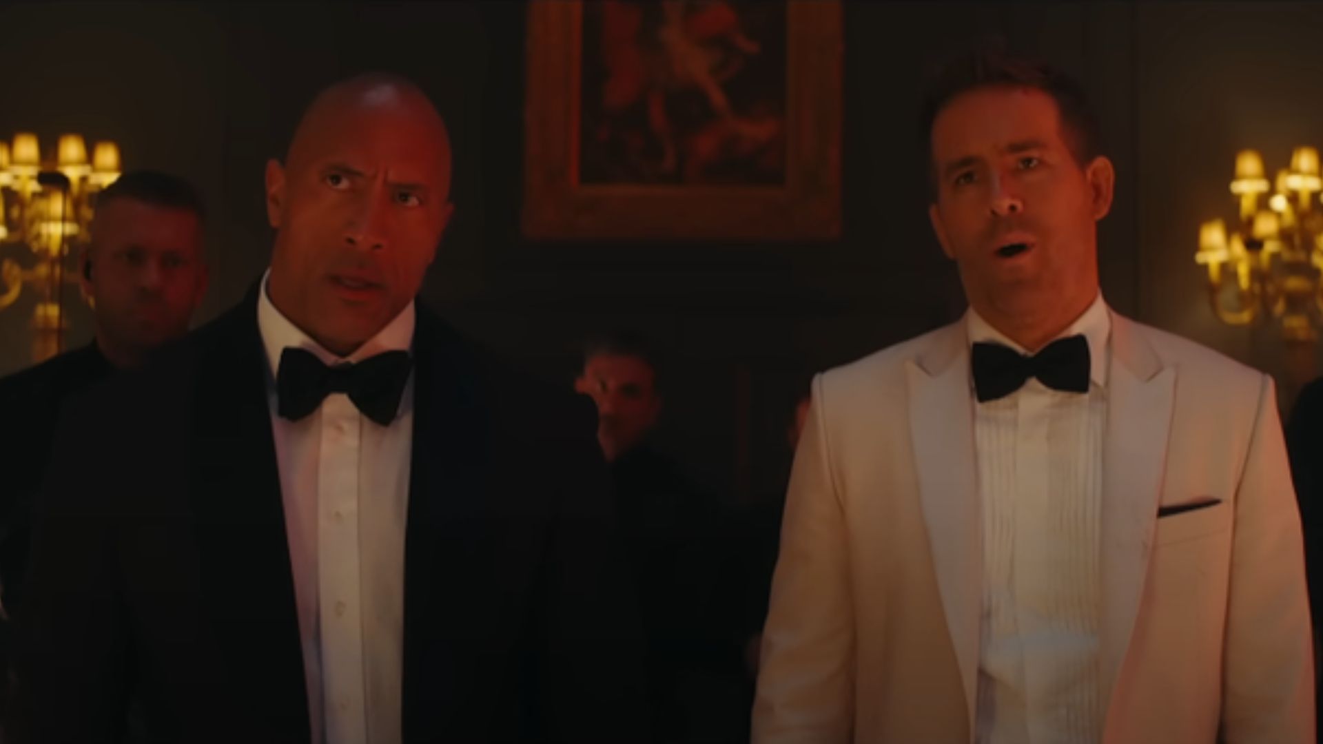 Dwayne Johnson and Ryan Renolds in Red Notice | Image via Netflix YouTube