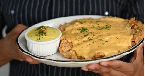 As big as your face fried chicken steak (Image via Instagram/ @moonshine_atx)