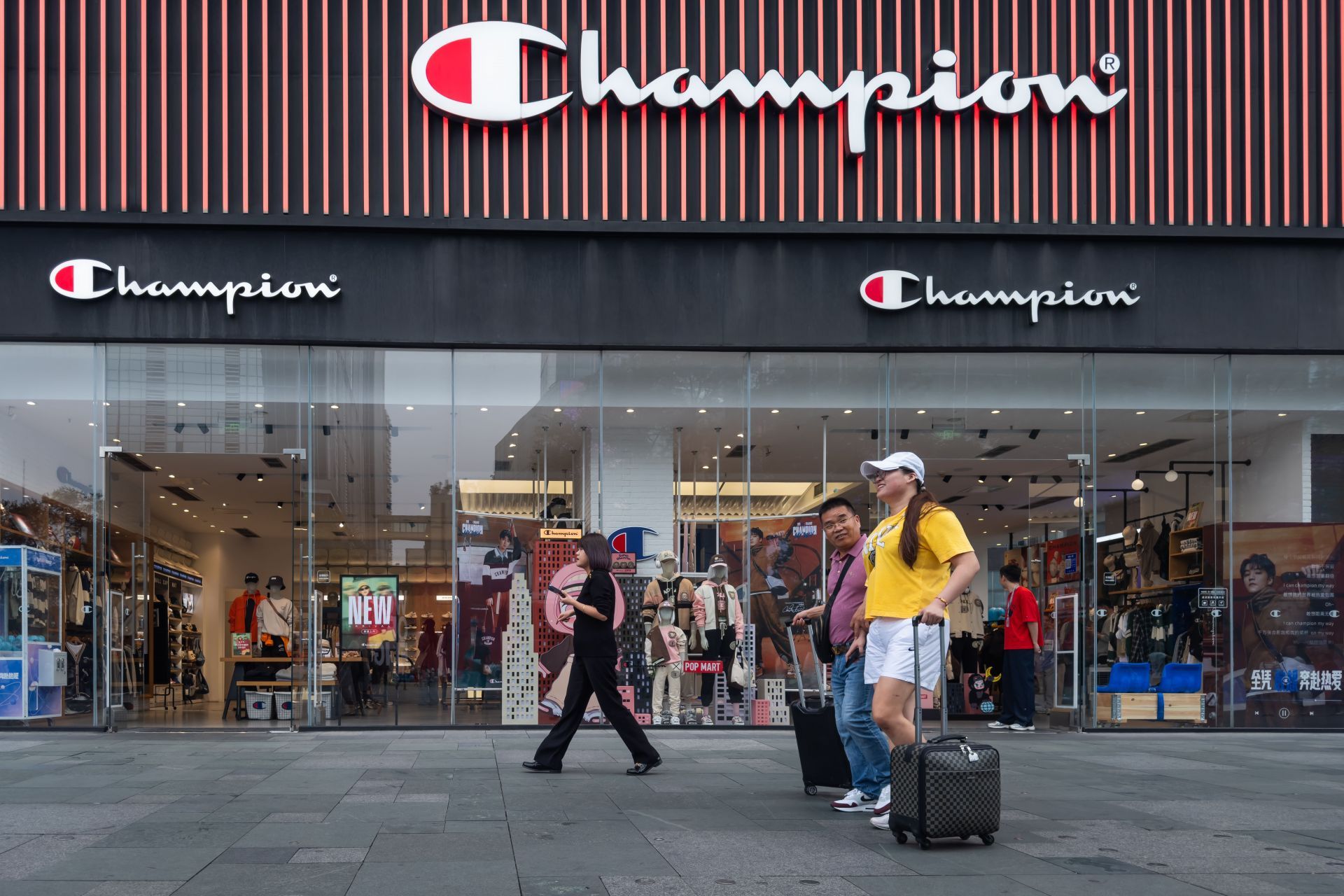 Shoppers Outside Champion Store in Chengdu - Source: Getty