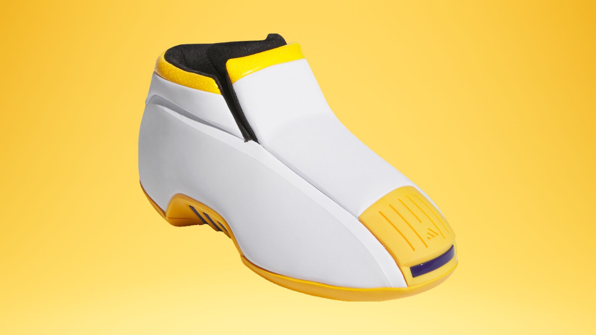 It comes in a white and yellow color scheme with accents of black and purple (Image via Kicks on Fire)