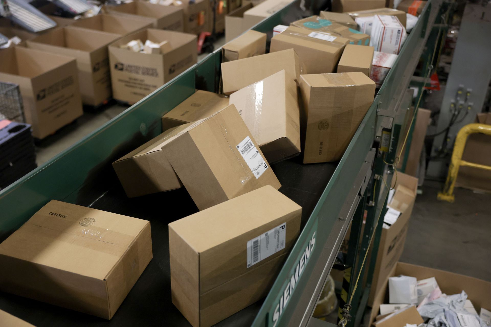 USPS withdrew its decision related parcels from China and Hong Kong on February 5, 2025 (Image via Joe Raedle/Getty Images)