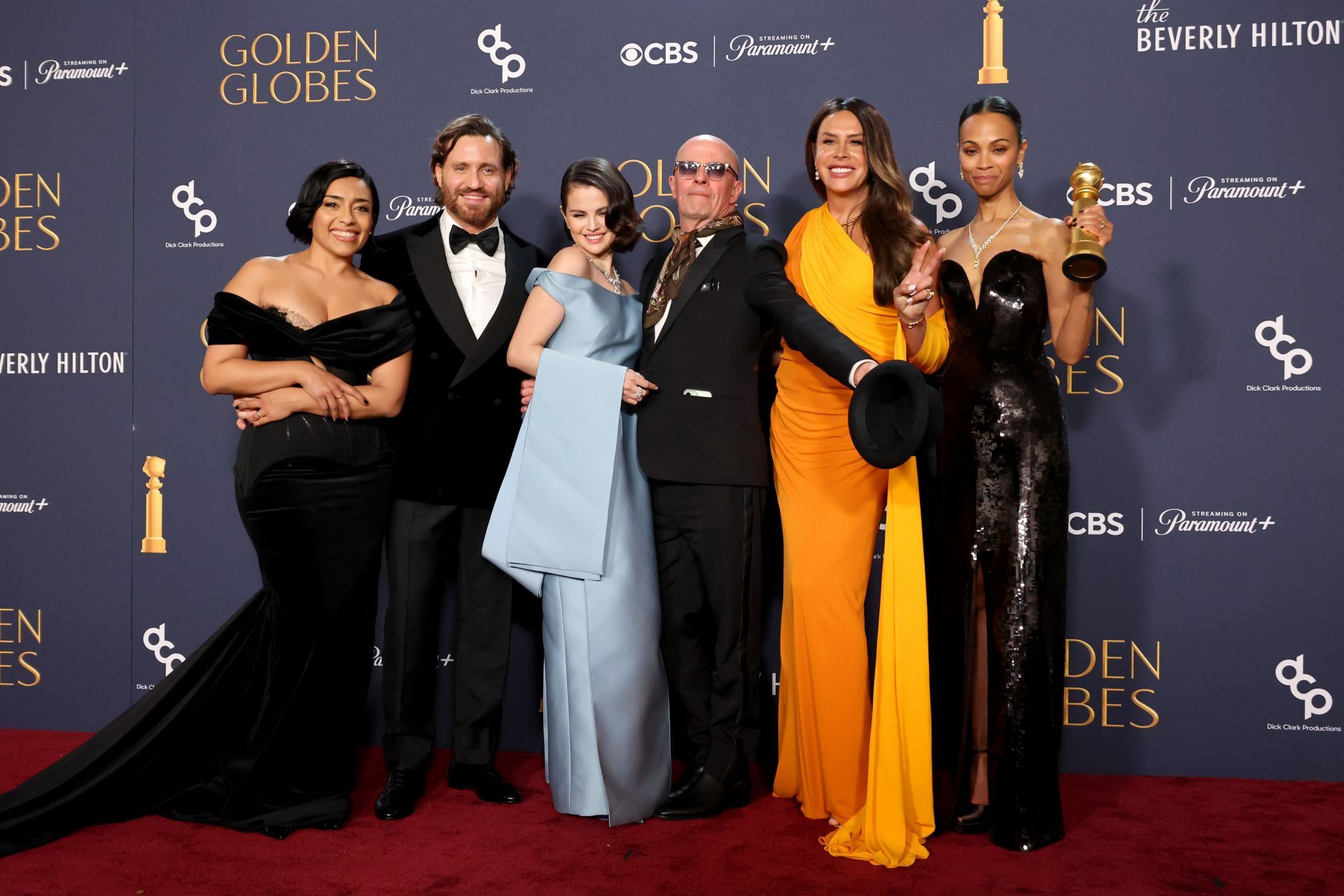 (L-R) Adriana Paz, Edgar Ram&iacute;rez, Selena Gomez, Jacques Audiard, Karla Sof&iacute;a Gasc&oacute;n, and Zoe Saldana, winners of the Best Motion Picture - Musical or Comedy award for &ldquo;Emilia P&eacute;rez,&rdquo; pose in the press room during the 82nd Annual Golden Globe Award at The Beverly Hilton on January 05, 2025 in Beverly Hills, California. (Photo by Amy Sussman/Getty Images)