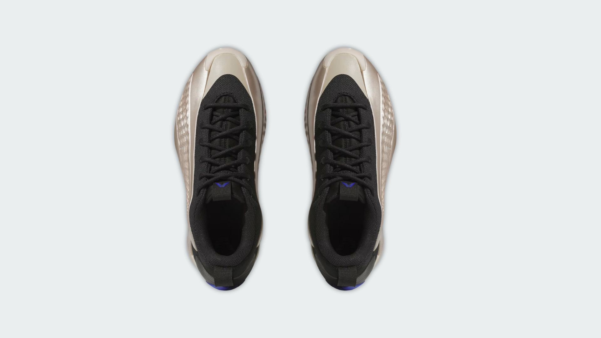 Front view of Adidas Anthony Edwards 1 Low &ldquo;Champagne Metallic&rdquo; sneakers (Image via adidas.com)