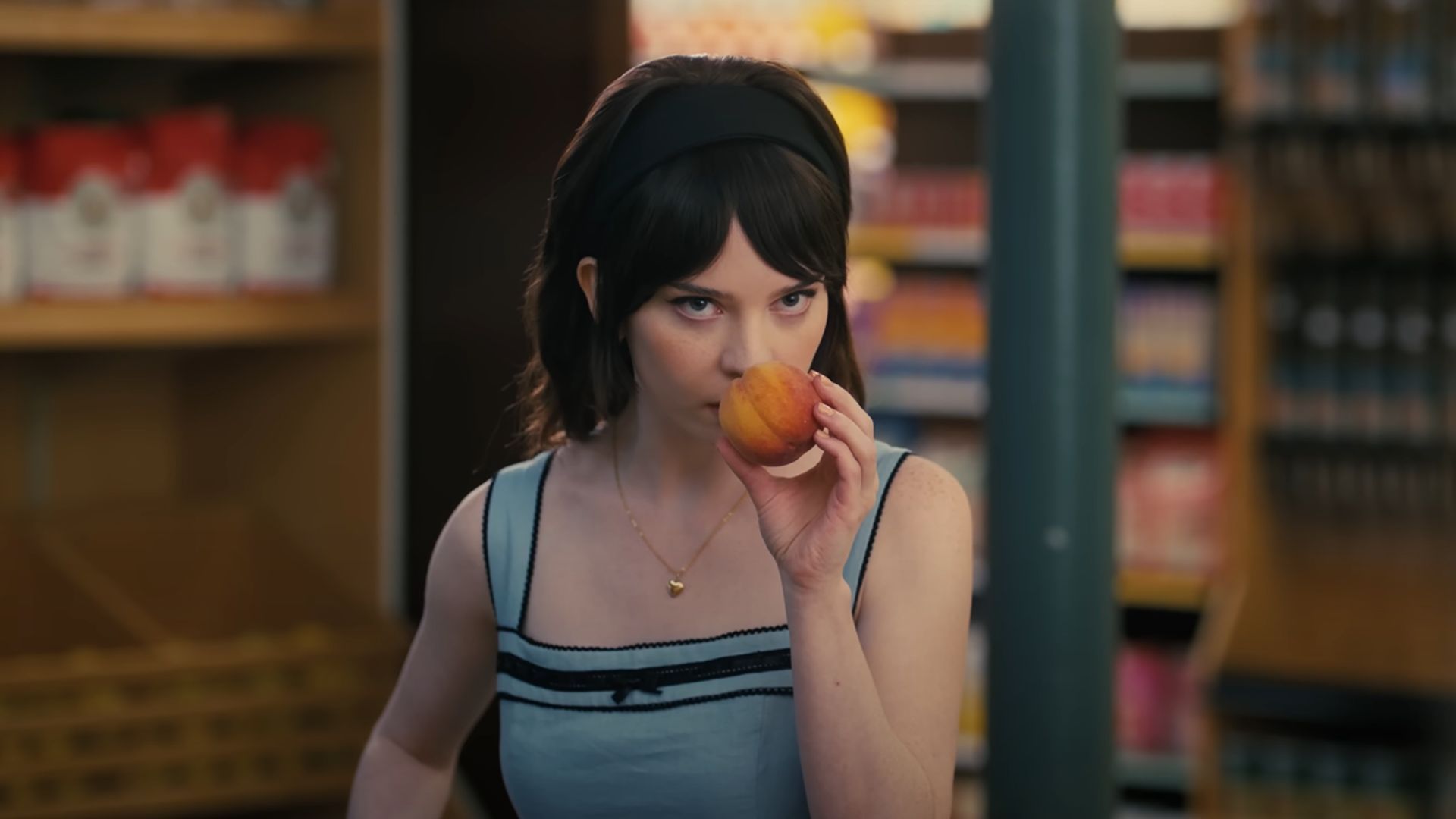 Iris smelling a fruit