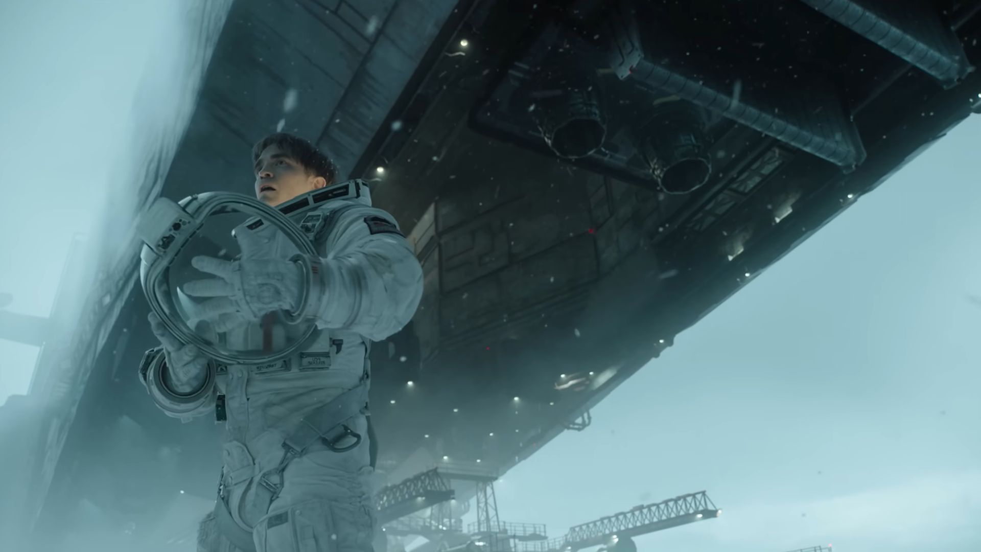 Mickey Barnes in a spacesuit on Niflheim in Mickey 17