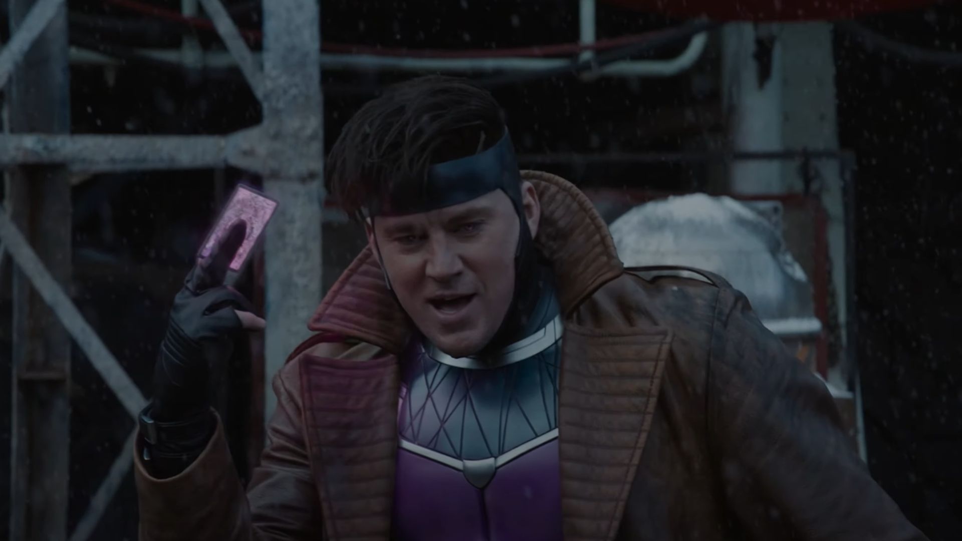 Gambit holding a glowing card