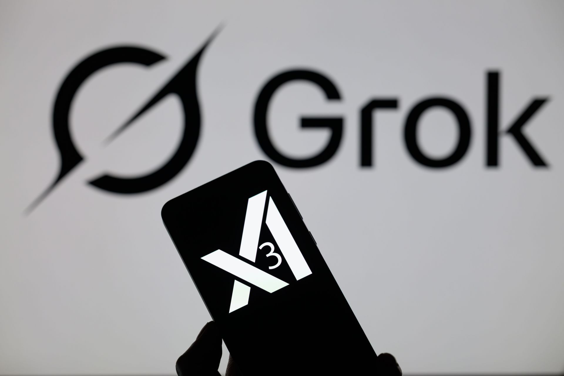 Grok X AI  - Photo Illustration - Source: Getty