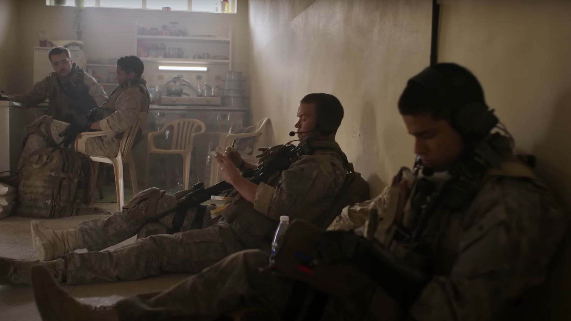Soldiers can be seen in a room