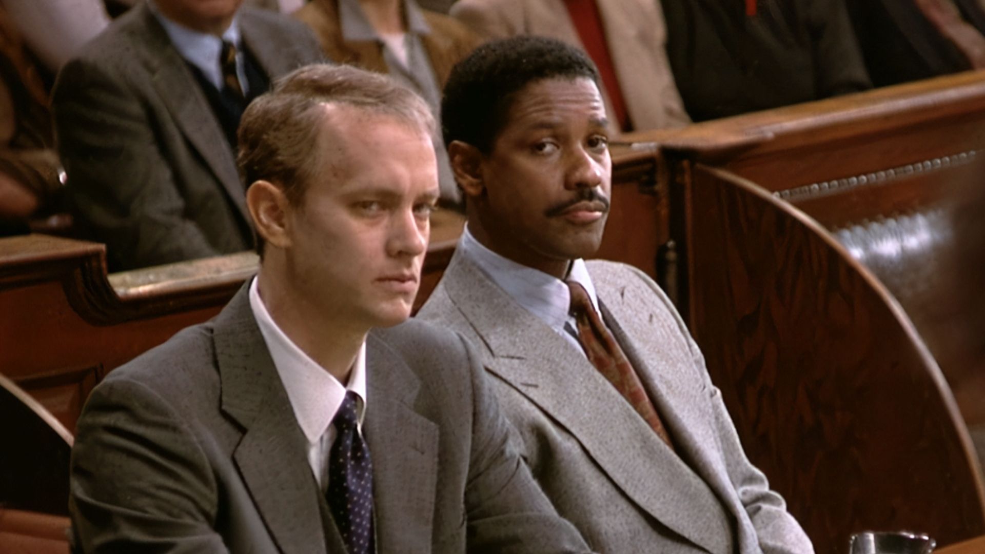 Tom Hanks with Denzel Washington in Philadelphia | Image via TriStar Pictures