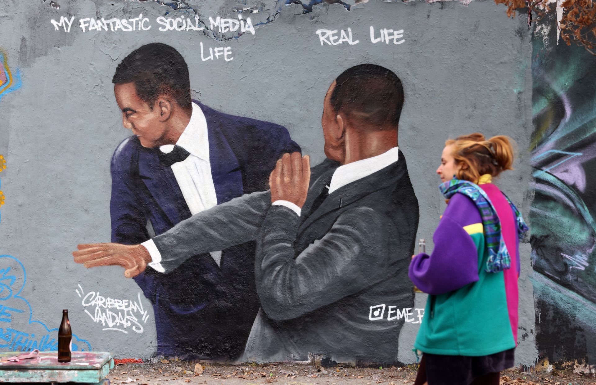 Graffiti Depicts Will Smith Slapping Chris Rock In Berlin - Source: Getty