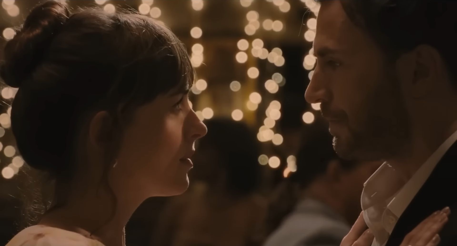 Dakota Johnson and Chris Evans as seen in 