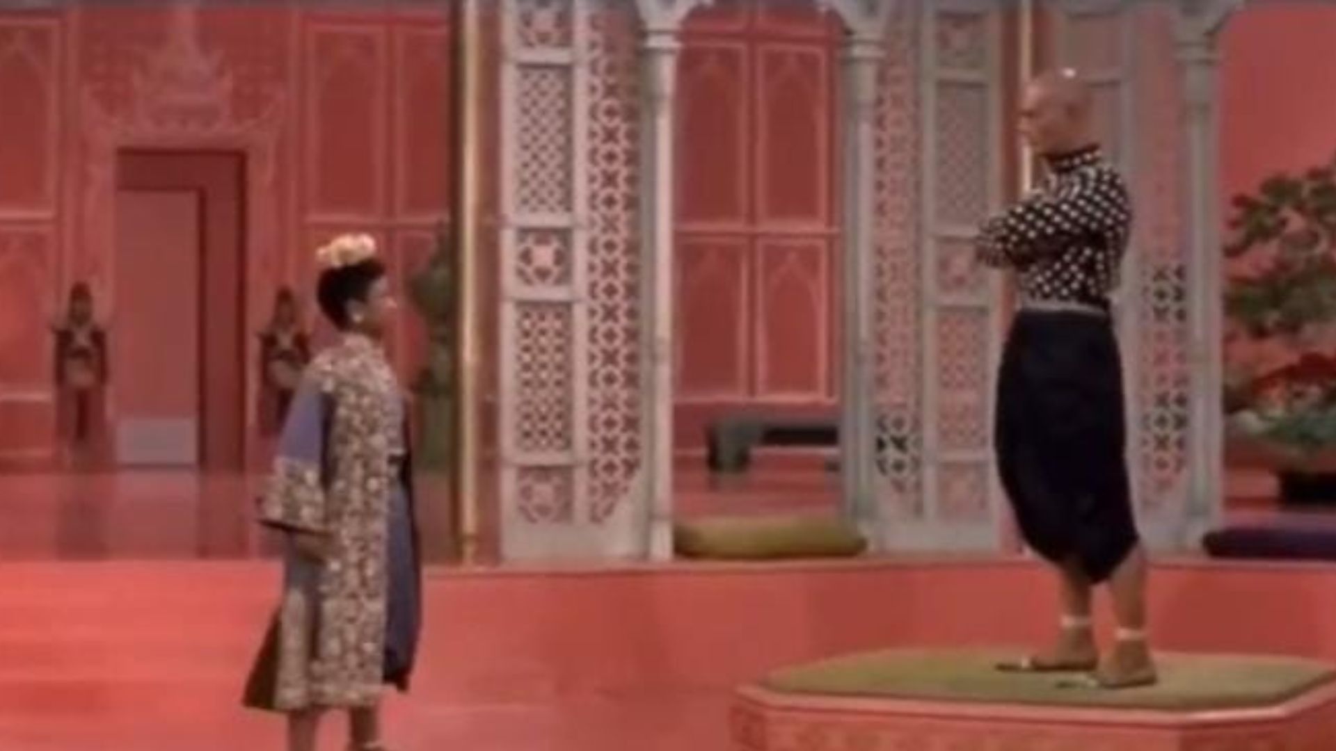 Patrick Adiarte (Left) as Prince Chulanglongkorn opposite Yul Brynner as King Mongkut in The King and I.(via X/Twitter/msteelewrites) )