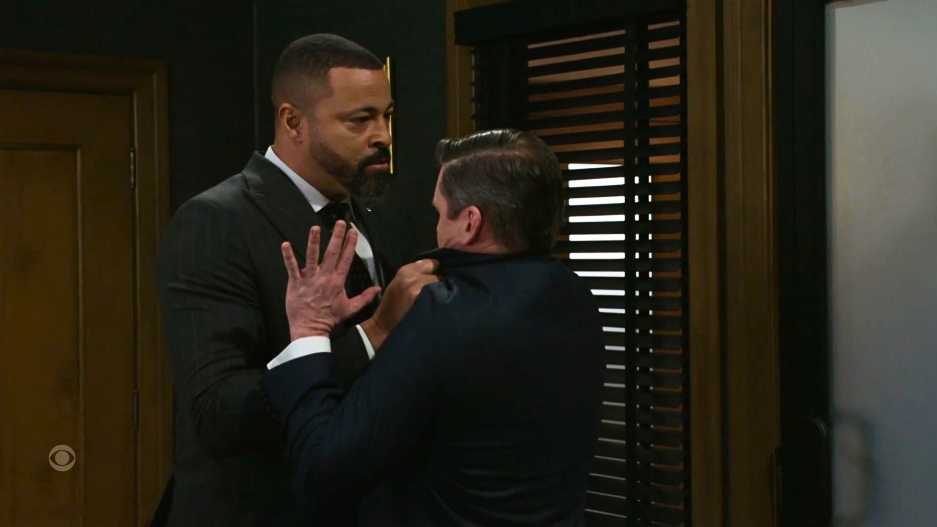 Beyond the Gates: Bill near throttles Mike Davis | Image Source: CBS