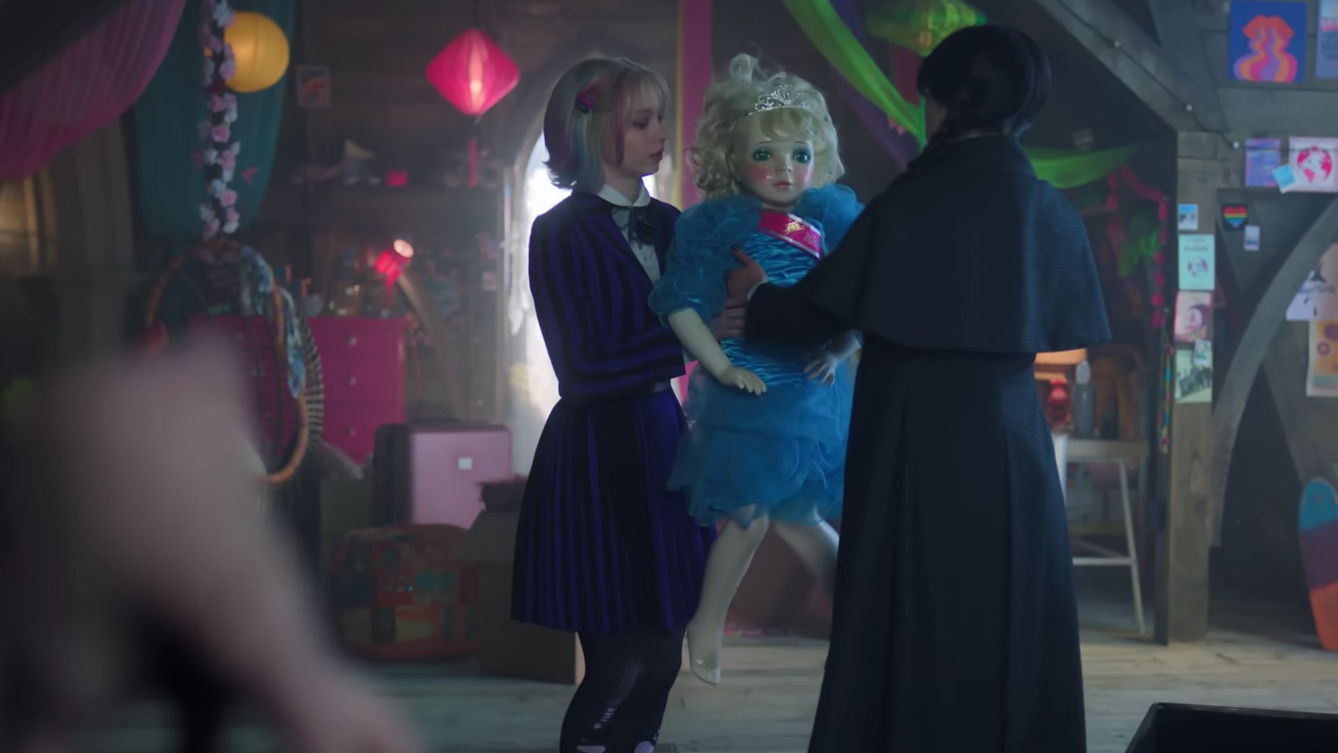 Wednesday giving Enid a doll. (Screensht from Wednesday: Season 2 Official Teaser Trailer/Netflix on YouTube)