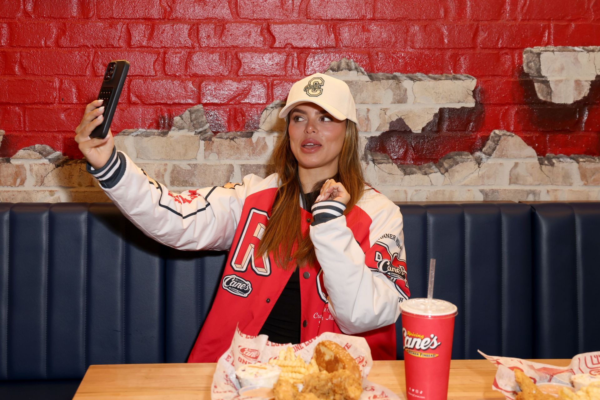 &quot;Sports Illustrated&quot; Model Brooks Nader, Bravo Star Ciara Miller, &quot;The Bachelor&quot; Star Kelsey Anderson, And University Of Texas NIL Athlete Sam Hurley Strike A Pose For Raising Cane
