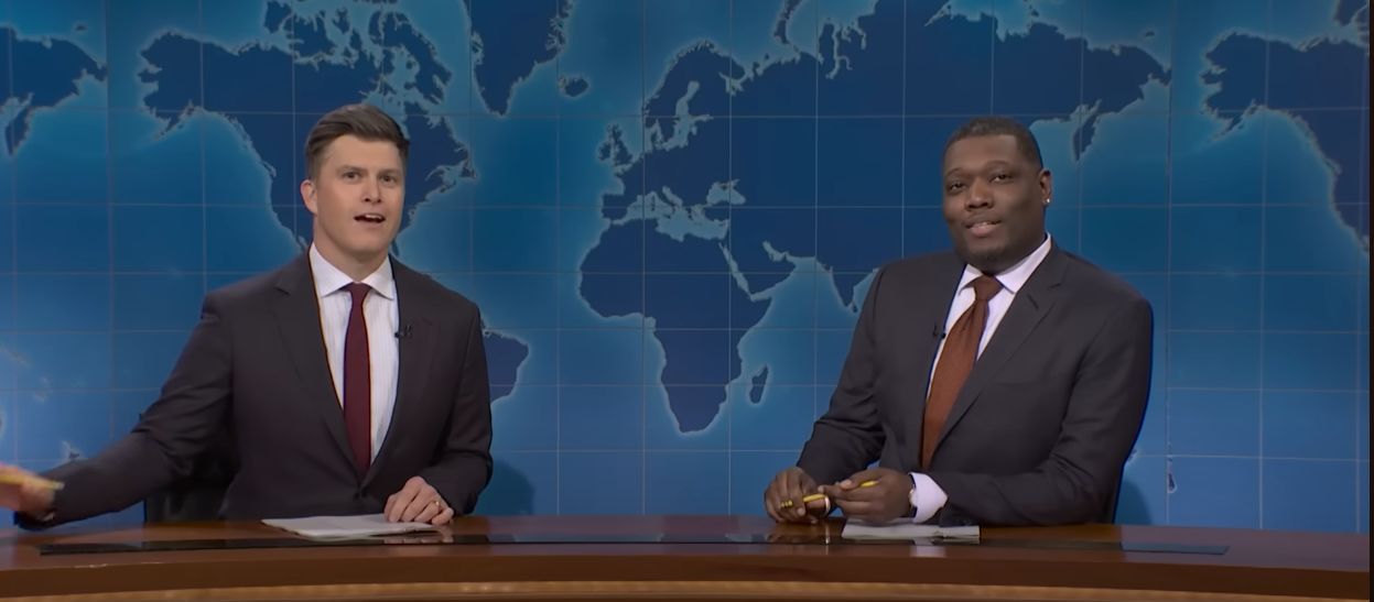A still from Saturday Night Live featuring Colin Jost and Michael Che | Image Source: YouTube/@SaturdayNightLive