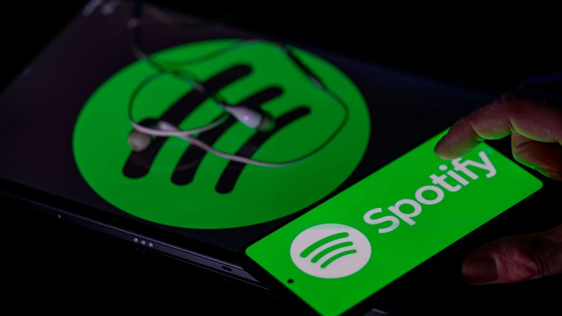 Spotify - Photo Illustration - Source: Getty