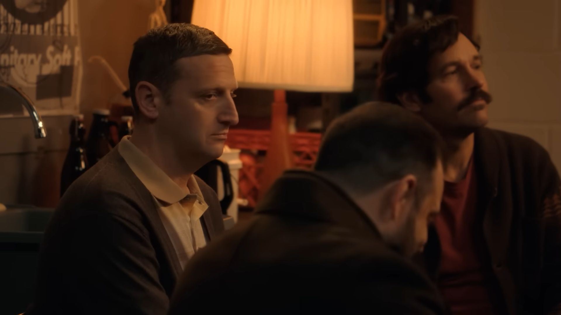 Tim Robinson with Paul Rudd blurred in the background