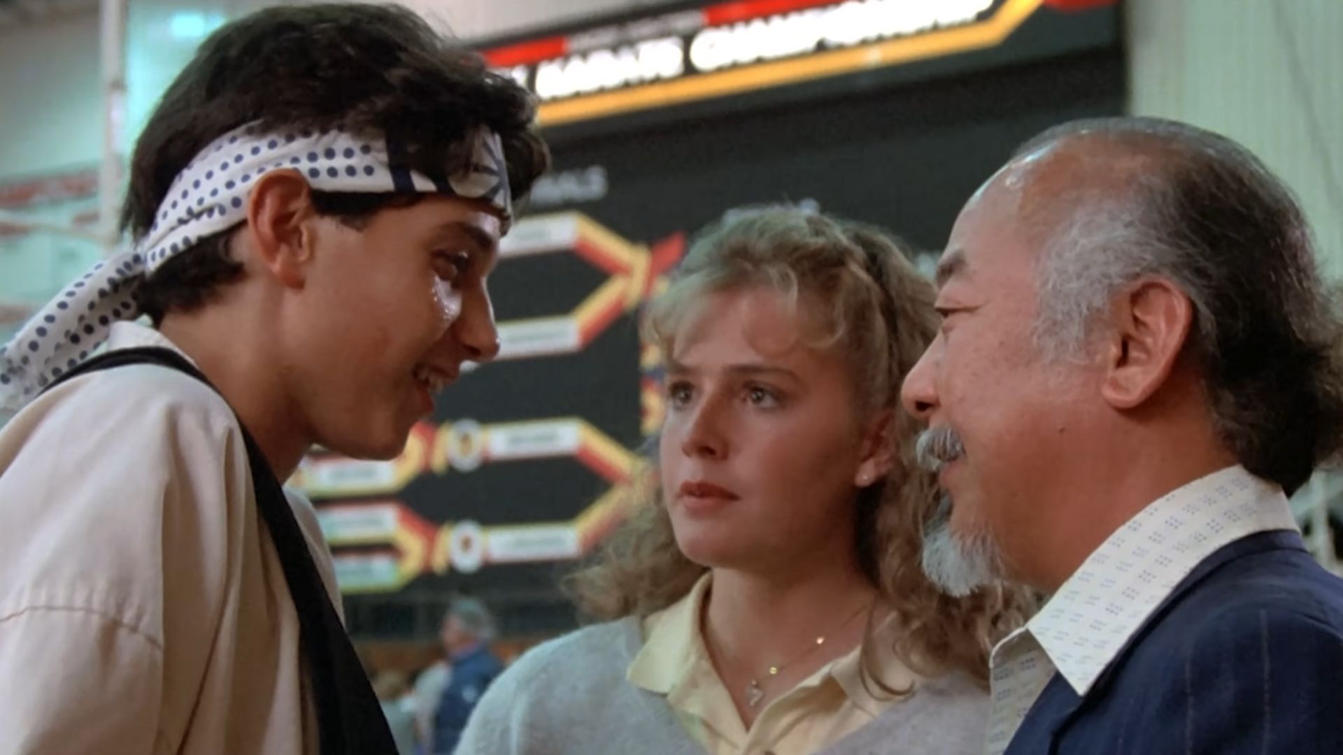 Daniel LaRusso with Mr. Miyagi and Ali Mills
