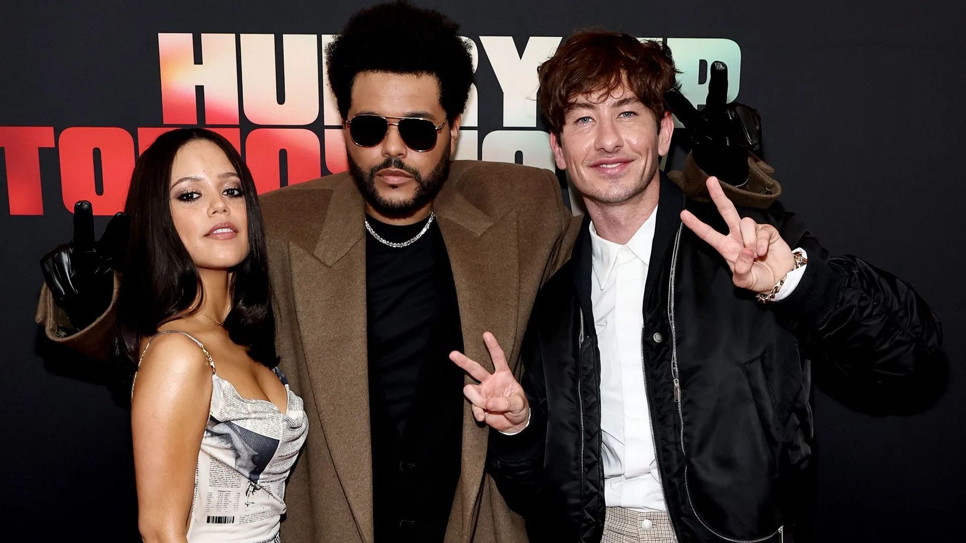 The Weeknd, Jenna Ortega, and Barry Keoghan at the Hurry Up Now Red Carpet Premiere (Getty via Soap Central CMS - Resized on Canva)