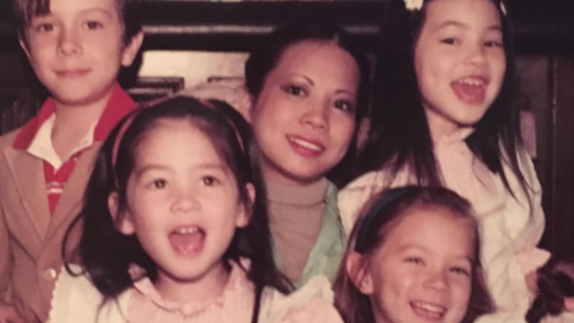Childhood photo of Olivia Munn and her siblings with their mother (Image via Instagram)