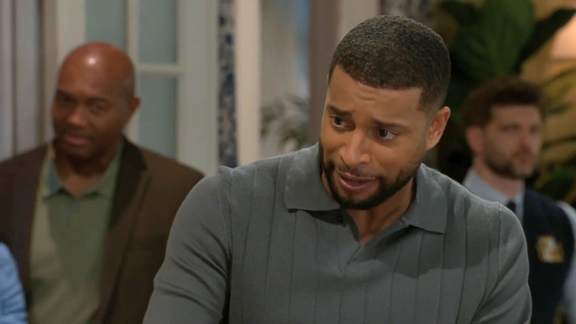 Beyond the Gates: Anyone spot Kenny just to the right of Martin? | Image: CBS