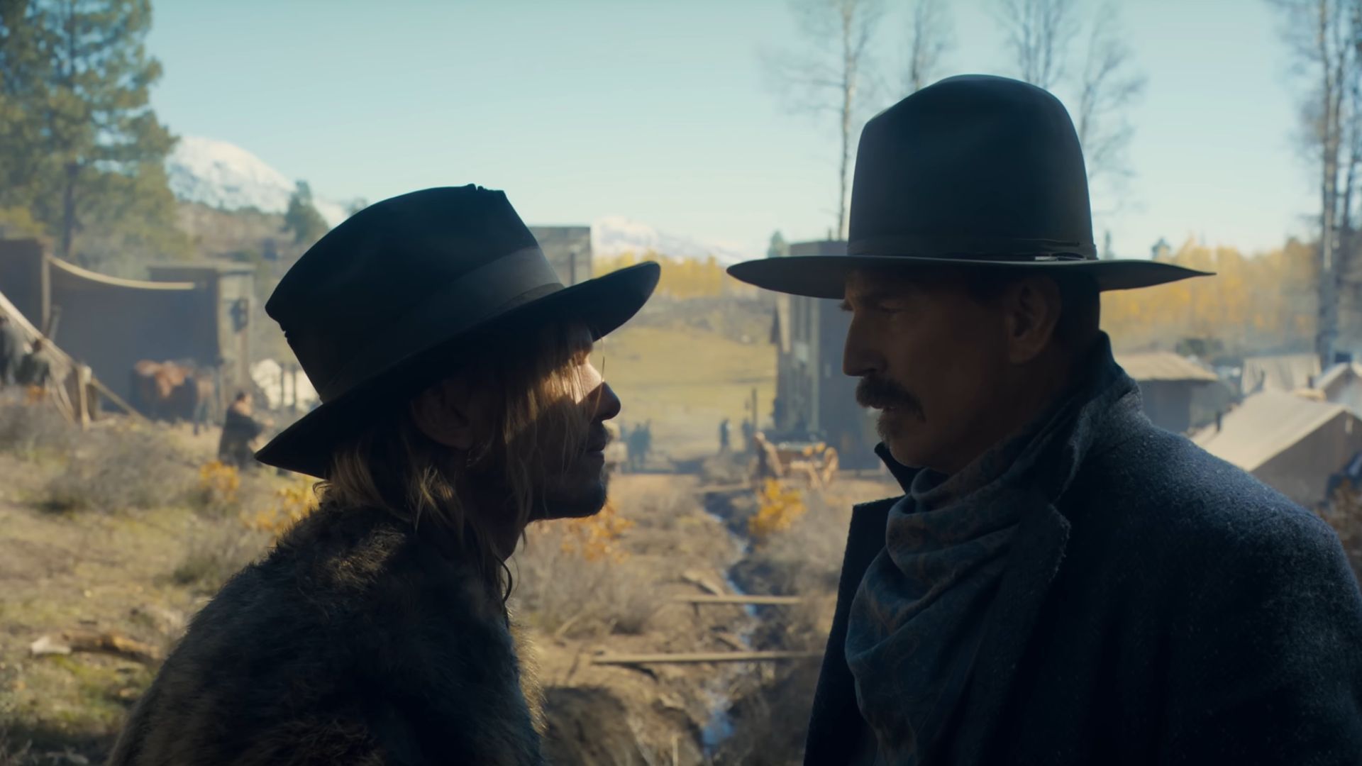 Two cowboys talking