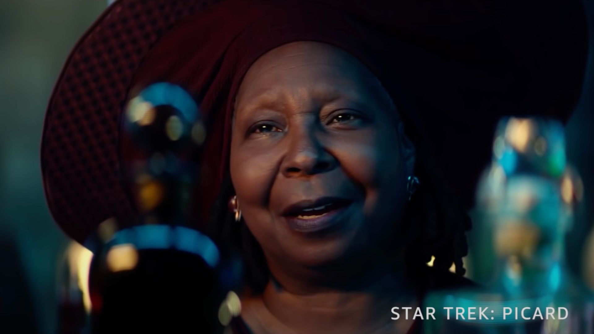 Guinan, portrayed by Whoopi Goldberg, in Star Trek (Image via YouTube/Prime Video AU &amp; NZ)