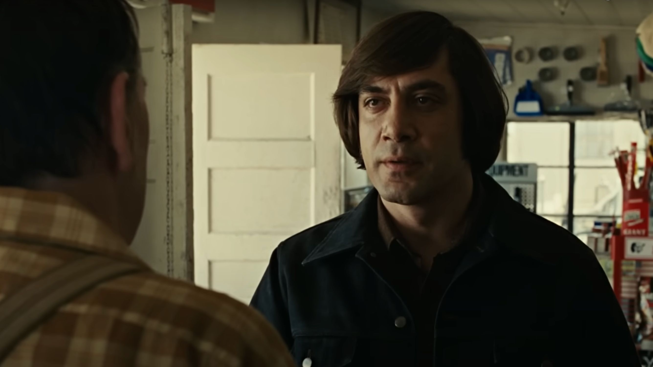 Javier Bardem as Anton Chigurh in No Country for Old Men (Image via YouTube/StreamOnMax)