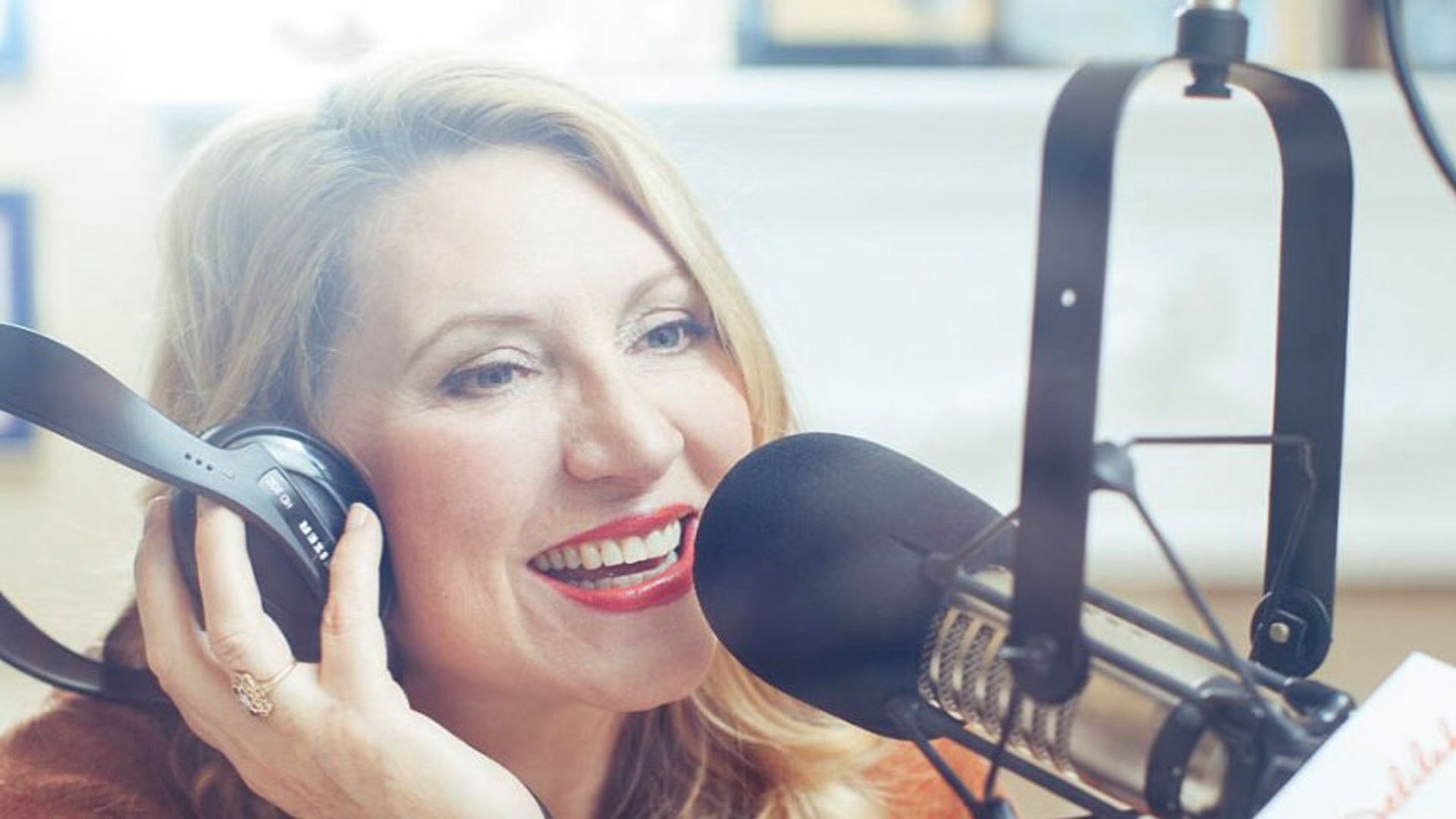 Radio host Delilah recording her show (Image via Instagram/@radiodelilah)