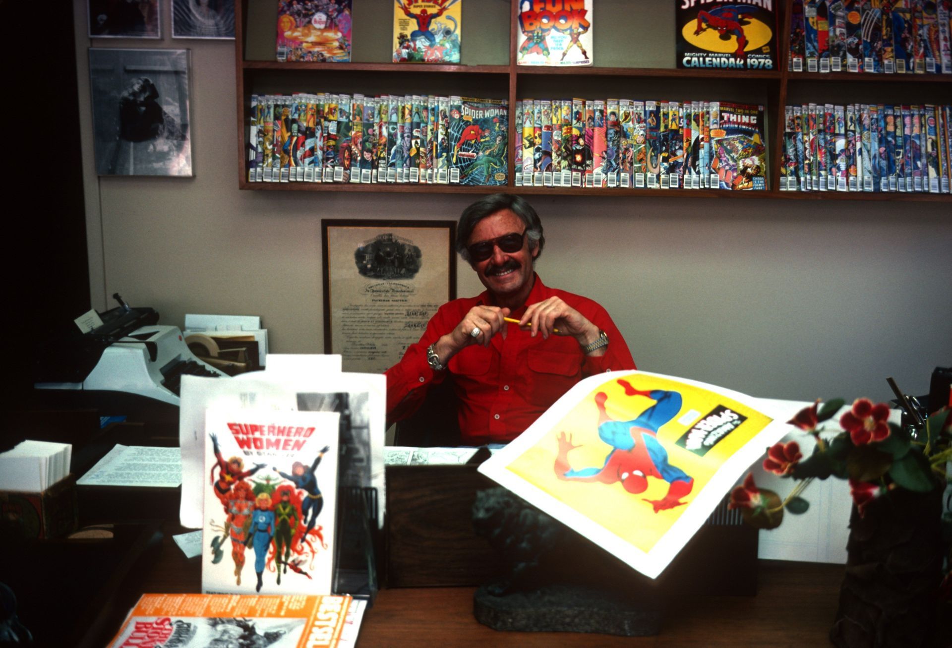 Stan Lee Posing For A Photo - Source: Getty