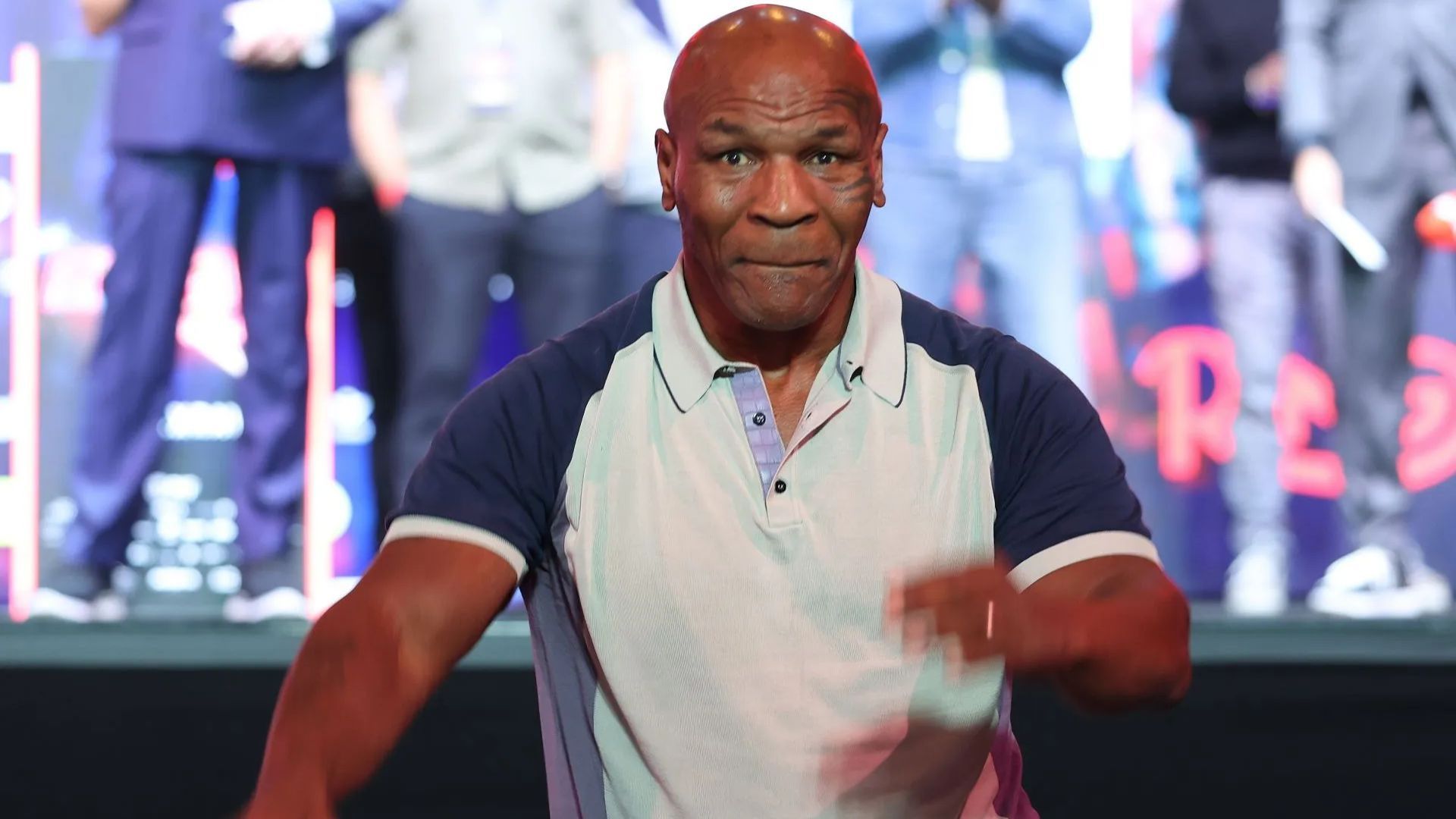 Mike Tyson (Getty via Soap Central CMS - Resized on Canva) 